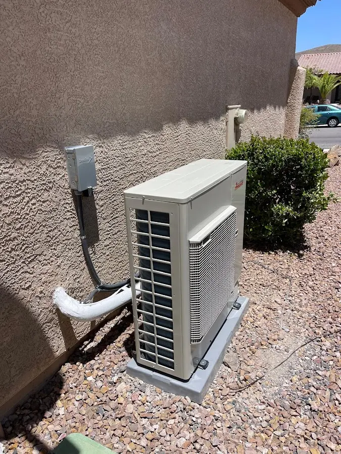 Residential air conditioning condenser unit in Scott